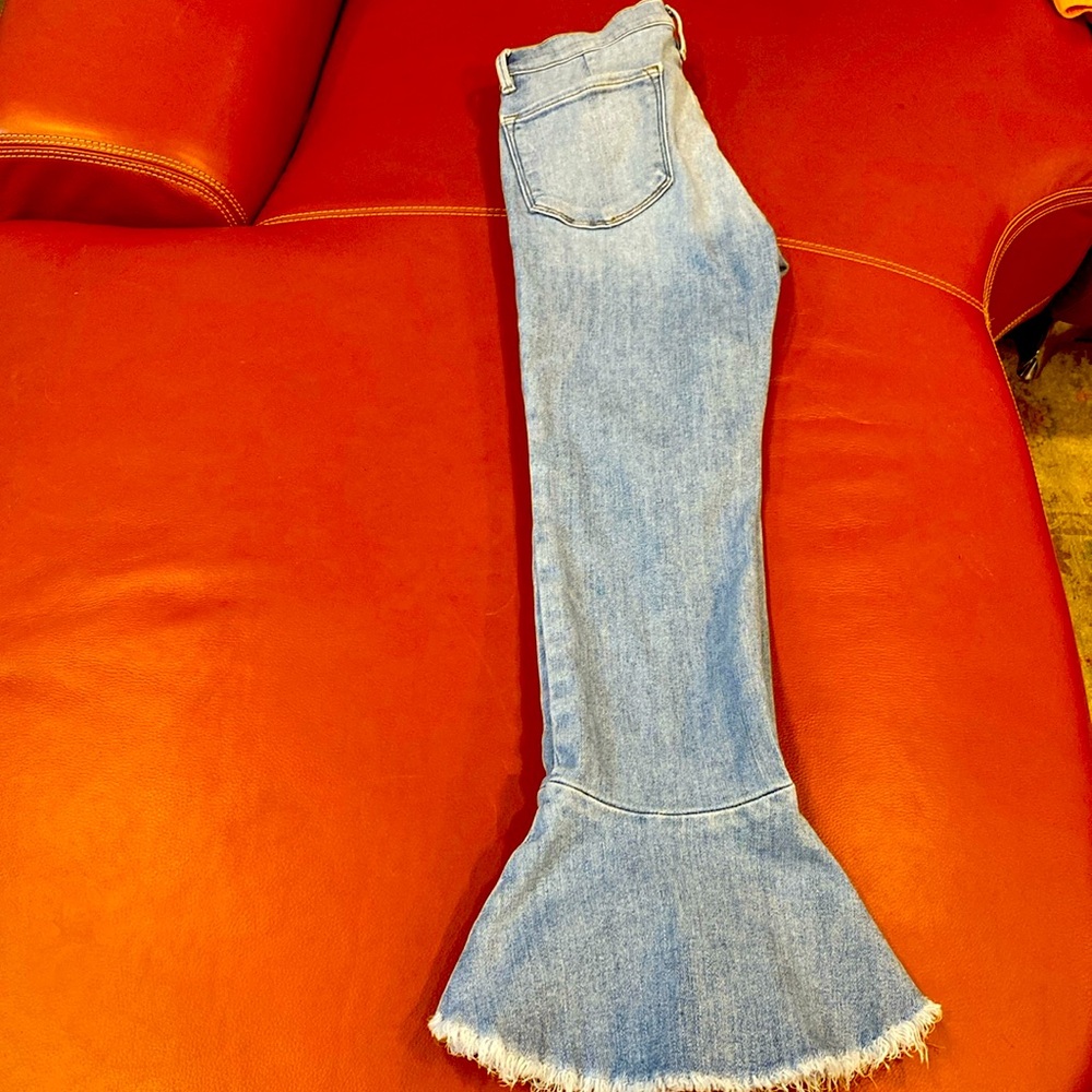 Frame crop flared jeans.  Medium wash.